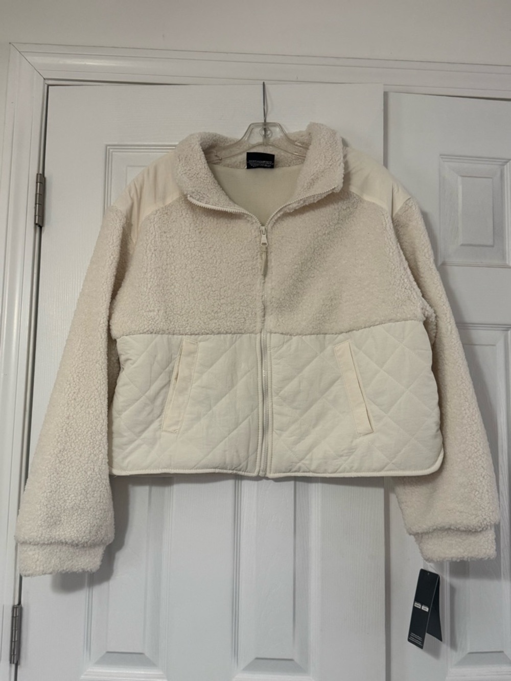 Skechers cropped mixed-media fleece jacket. Size US XL.